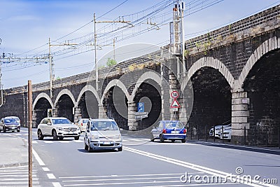 Catania, Sicily, Italy â€“ august 04, 2018: street view: cars go on the road near the bridge Editorial Stock Photo